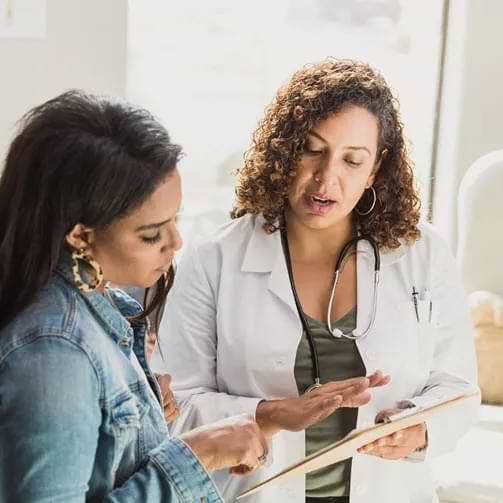 Doctor reviewing chart image